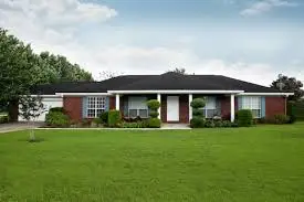 Large brick home on a grasses lot